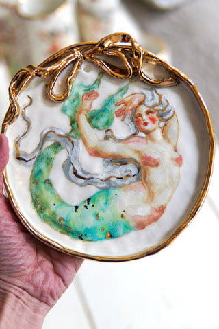 "Siren with Bow Frame" Porcelain Painting