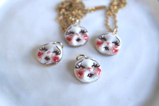 “Moon Face” Charm