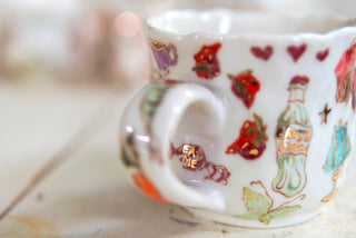 "Orange Cat, Turquoise Chair" Porcelain Mug